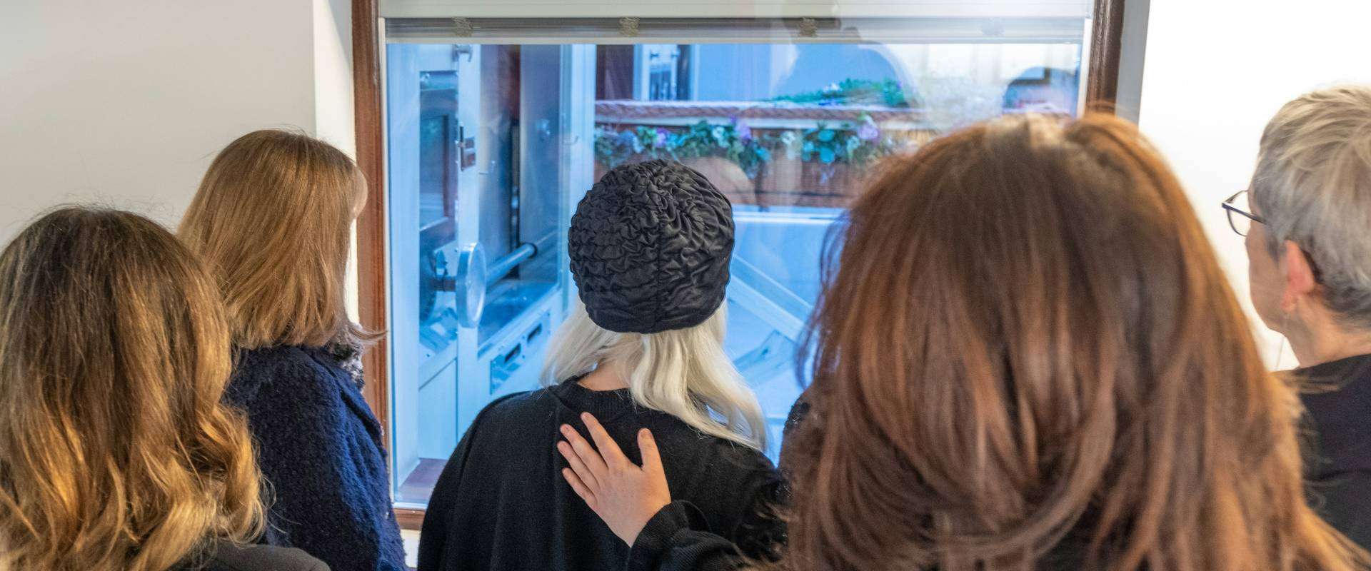 Family attending a funeral service in Arizona